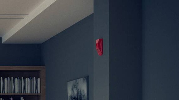 Fire alarm mounted on a wall